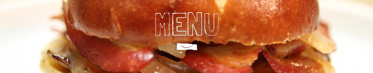 A closeup of a burger with a text over 'Menu'.